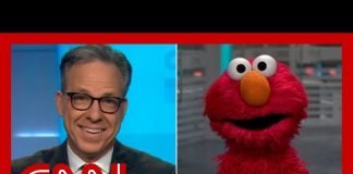 Elmo asked us all how we were doing. Jake Tapper decided to ask him too