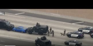 Driver of car causing 91 freeway closure is communicating with crisis negotiating teams
