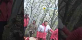 Iranian rescuers transfer bodies found from helicopter crash