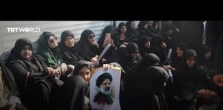 Iranians attending Raisi's funeral react to president's death
