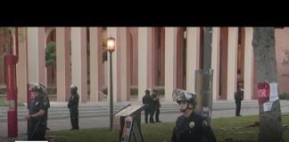 LAPD officers in riot gear clear pro-Palestine encampment at USC