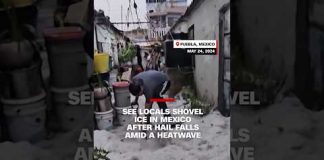 See locals shovel ice in Mexico after hail falls amid a heatwave