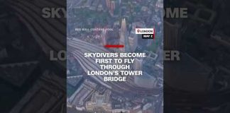 Skydivers become the first to fly through London's Tower Bridge
