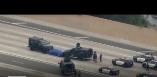 Watch Live: Police standoff shuts down 91 Freeway in Anaheim Hills