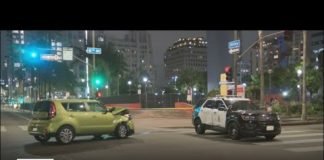Driver allegedly runs red light and crashes into LAPD cruiser