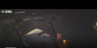 Man fires shotgun on Compton roof at deputies