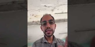 Palestinian man gathers remains of people killed at Nuseirat school