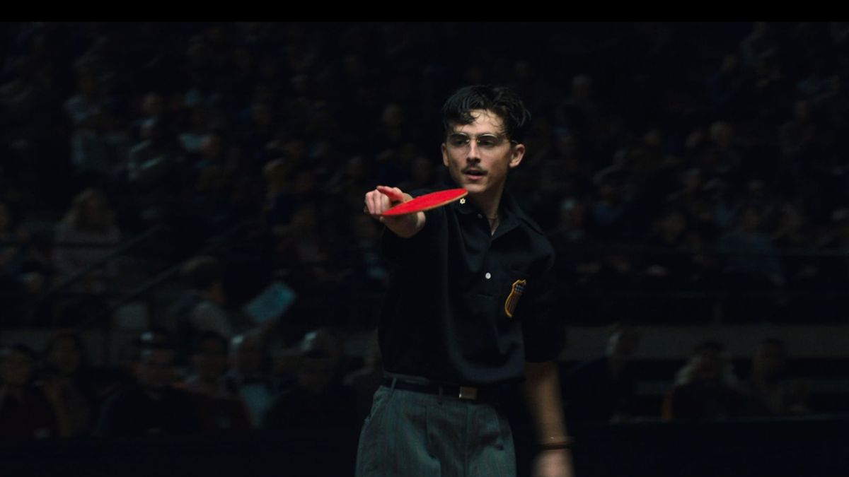 Marty character playing table tennis in a dark, high-tension arena.
